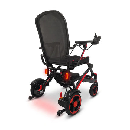 Rear view of the Ikon Enduro Powerlite Pro wheelchair showing rear lights, on white
